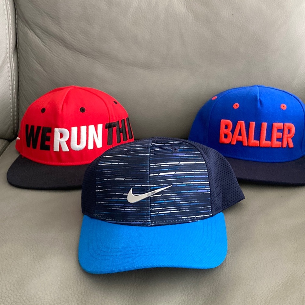 Nike Youth Ages 4-7 Baseball Caps- Navy, Royal and Red.